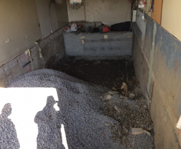 Extraction de la pyrite coule et finition de beton pour un garage a Boucherville - Travaux d'excavation afin de retirer la pyrite, remplir avec nouvelle roche, coule et finition de béton à Boucherville